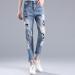 2017 New Women's Casual Denim Pants Cute Cartoon Print Ripped Hole Fashion Jeans Loose Student Harem Pants Pencil Pants - intl  