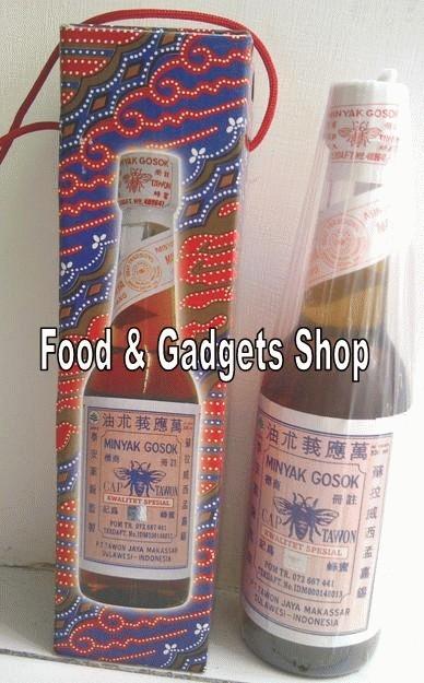 Minyak Gosok cap TAWON (tutup putih) produk kota Makassar