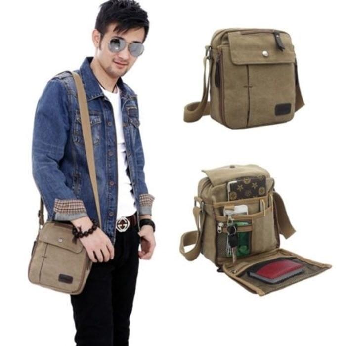 tas selempang pria / tas selempang pria kulit / tas selempang pria eiger / tas selempang pria polo / tas selempang pria keren / tas selempang pria bodypack / tas selempang kanvas pria /sling bag / tas slempang cowok / travel bag - Cokelat DISKON MURAH!!!