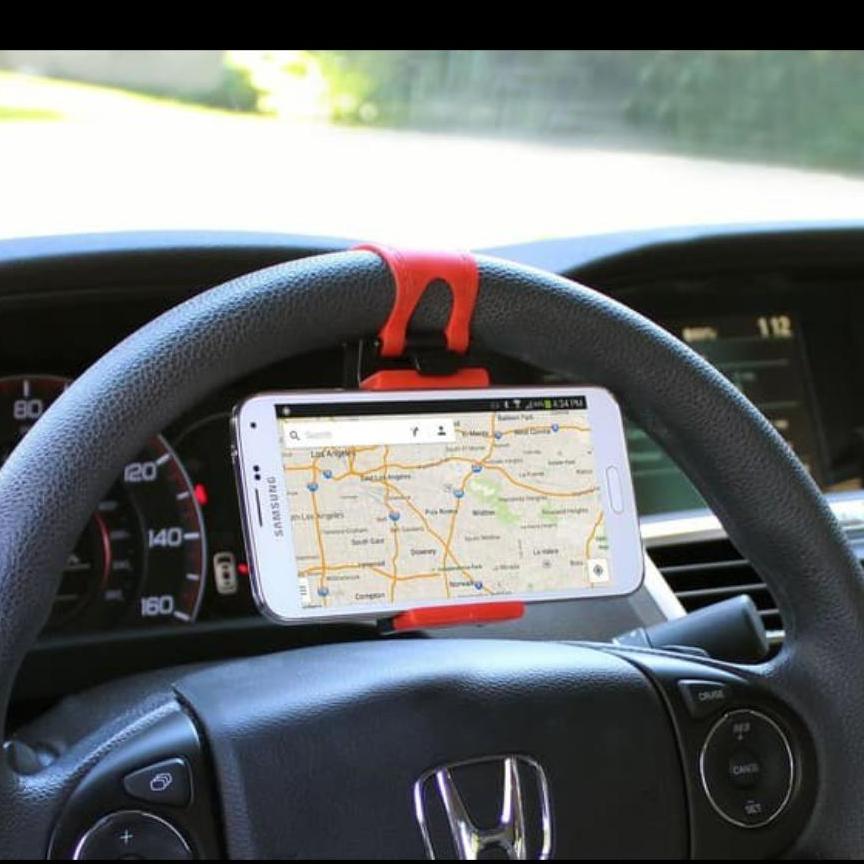 Holder setir mobil Car Steering Wheel Phone Socket Holder stir hp handphone GS UNIVERSAL BISA SEMUA MEREK HP - Dipasang pada stir mobil - Klip berpelindung silikon sehingga tidak merusak hp/gps anda - Pemasangan mudah, tidak perlu alat tambahan - Lebar