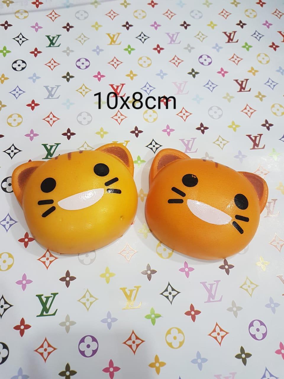 Sakura Squishy Kepala Smiley Cat