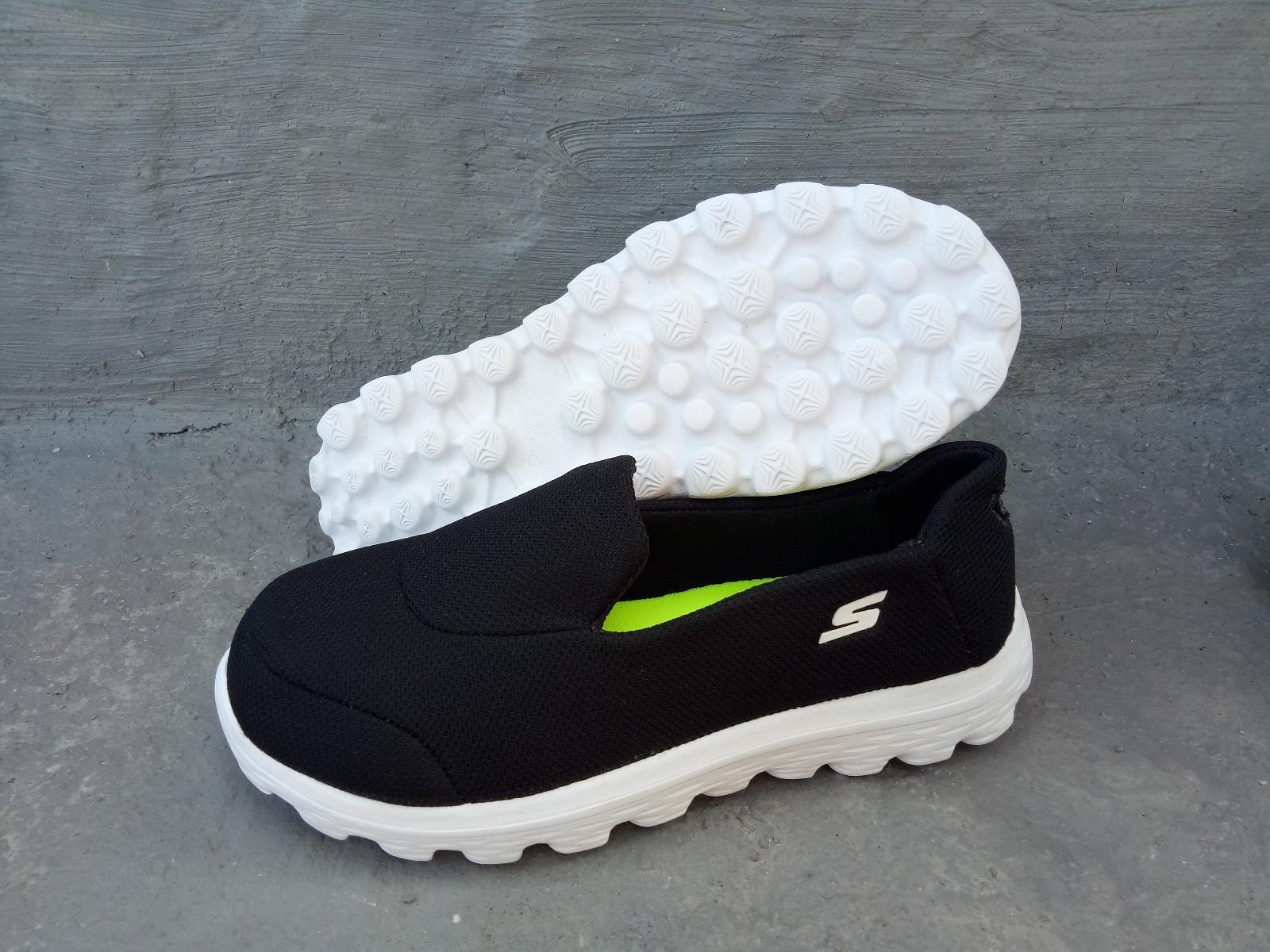 sepatu skechers go walk black white woman tag made in vietnam