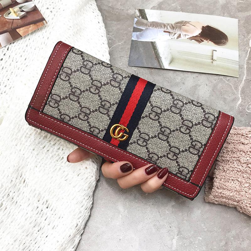 Model Panjang Dompet Wanita 2018 Model Baru Gaya Barat Modis Pasang Kancing Dompet Kapasitas Besar Minimalis Bersablon HP Tas Tangan