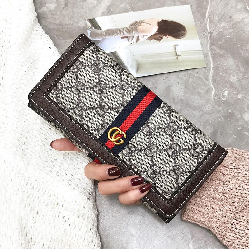 Model Panjang Dompet Wanita 2018 Model Baru Gaya Barat Modis Pasang Kancing Dompet Kapasitas Besar Minimalis Bersablon HP Tas Tangan