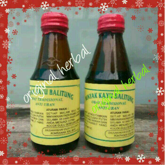 2 botol Minyak kayu balitung Kalimantan/penghilang uban
