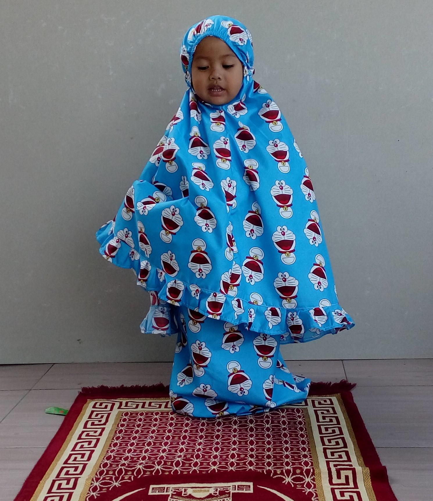 aly mukena doraemon uk.6-9 tahun