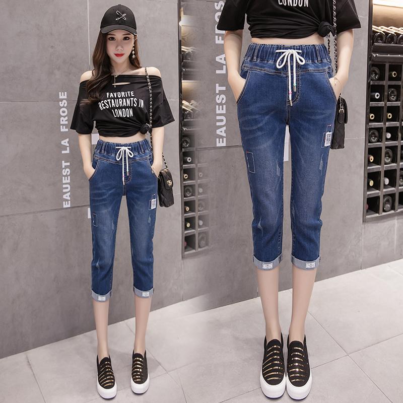 Foto Kandid Celana Jeans Wanita 2018 Musim Semi dan Musim Panas Model Baru Ukuran Besar Baju Wanita Gemuk Membentuk Tubuh Terlihat Langsing Celana Selutut