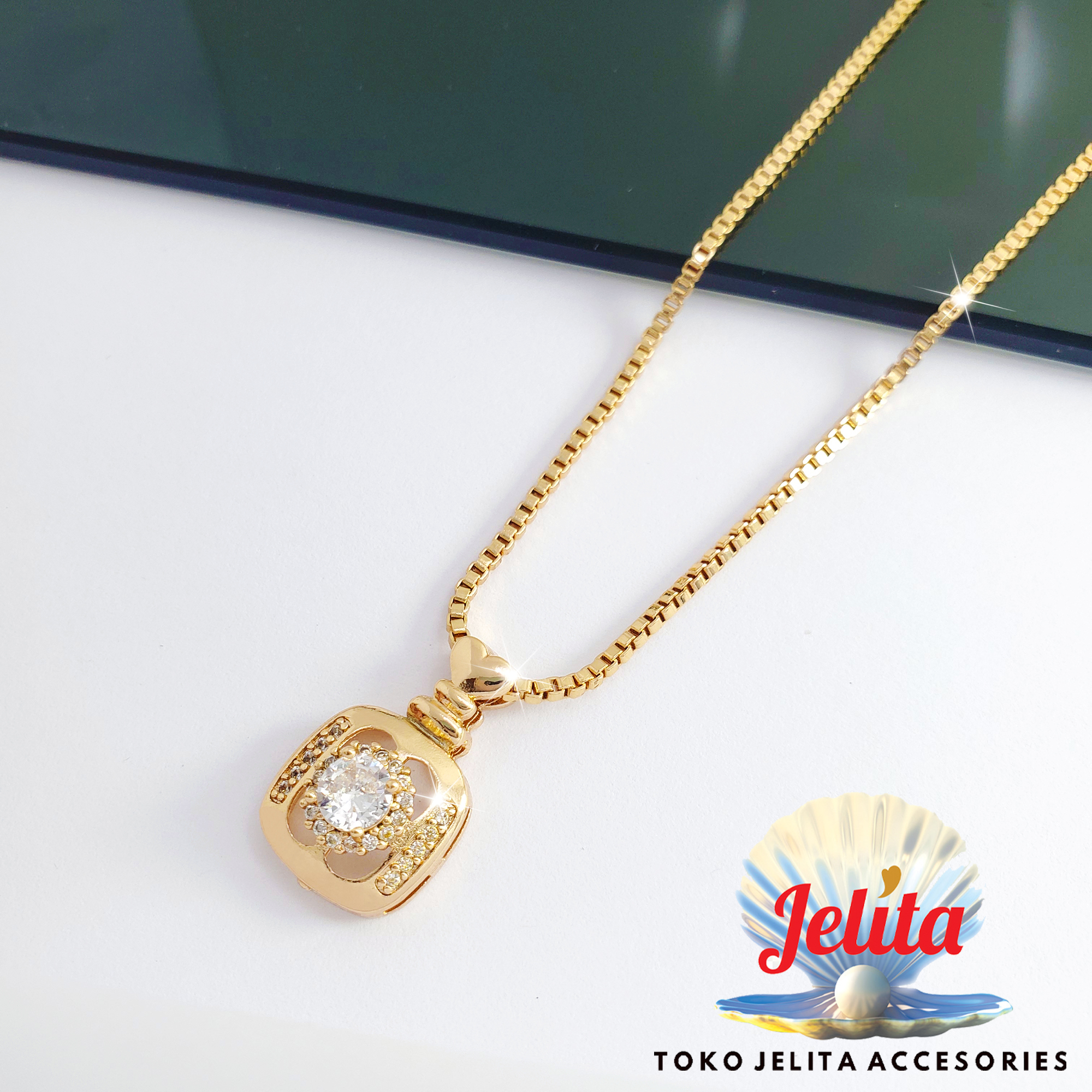 Kalung Titanium Liontin Motif Kotak Tas Permata Elghan Gold Lapis Emas 18k Lazada Indonesia