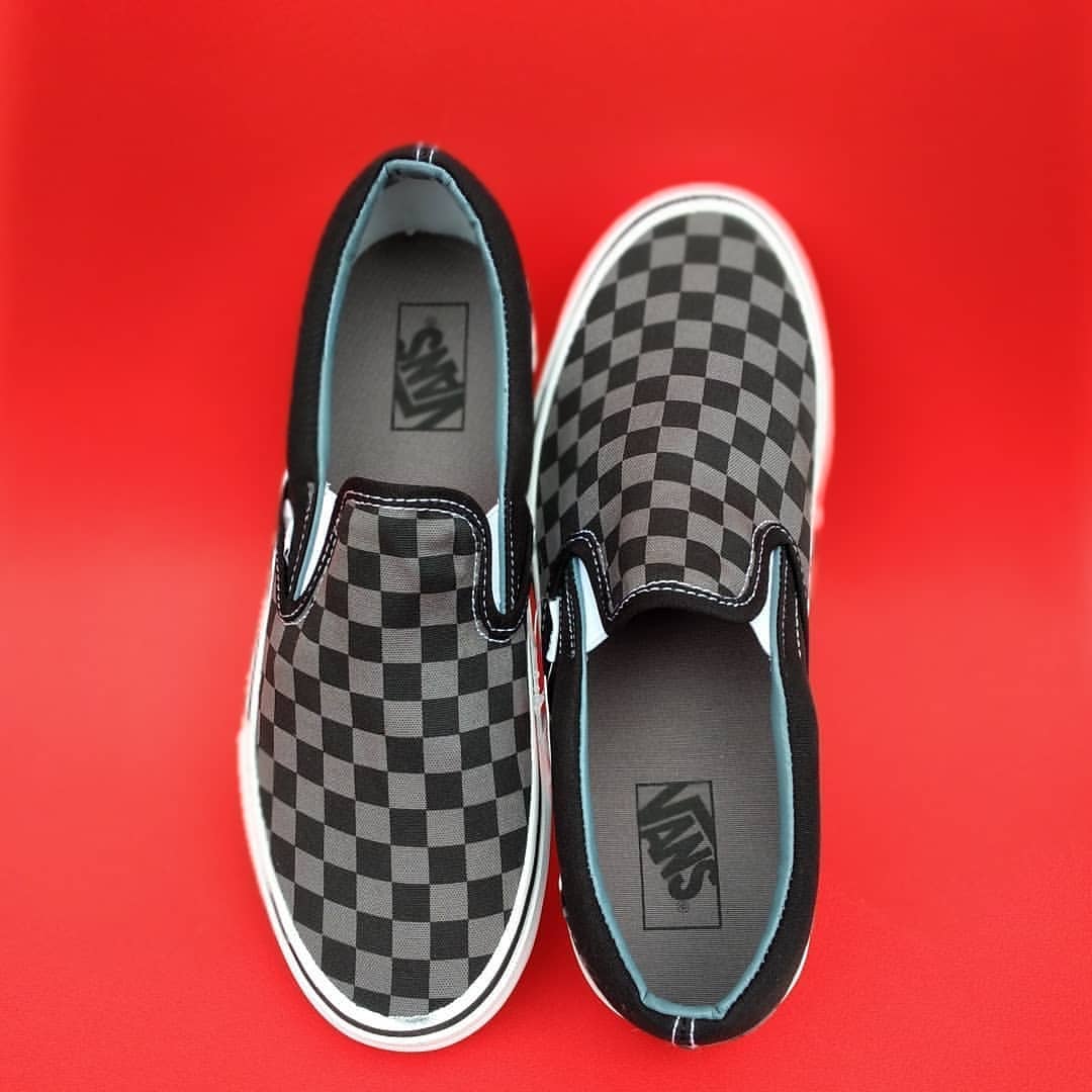 all black checker vans