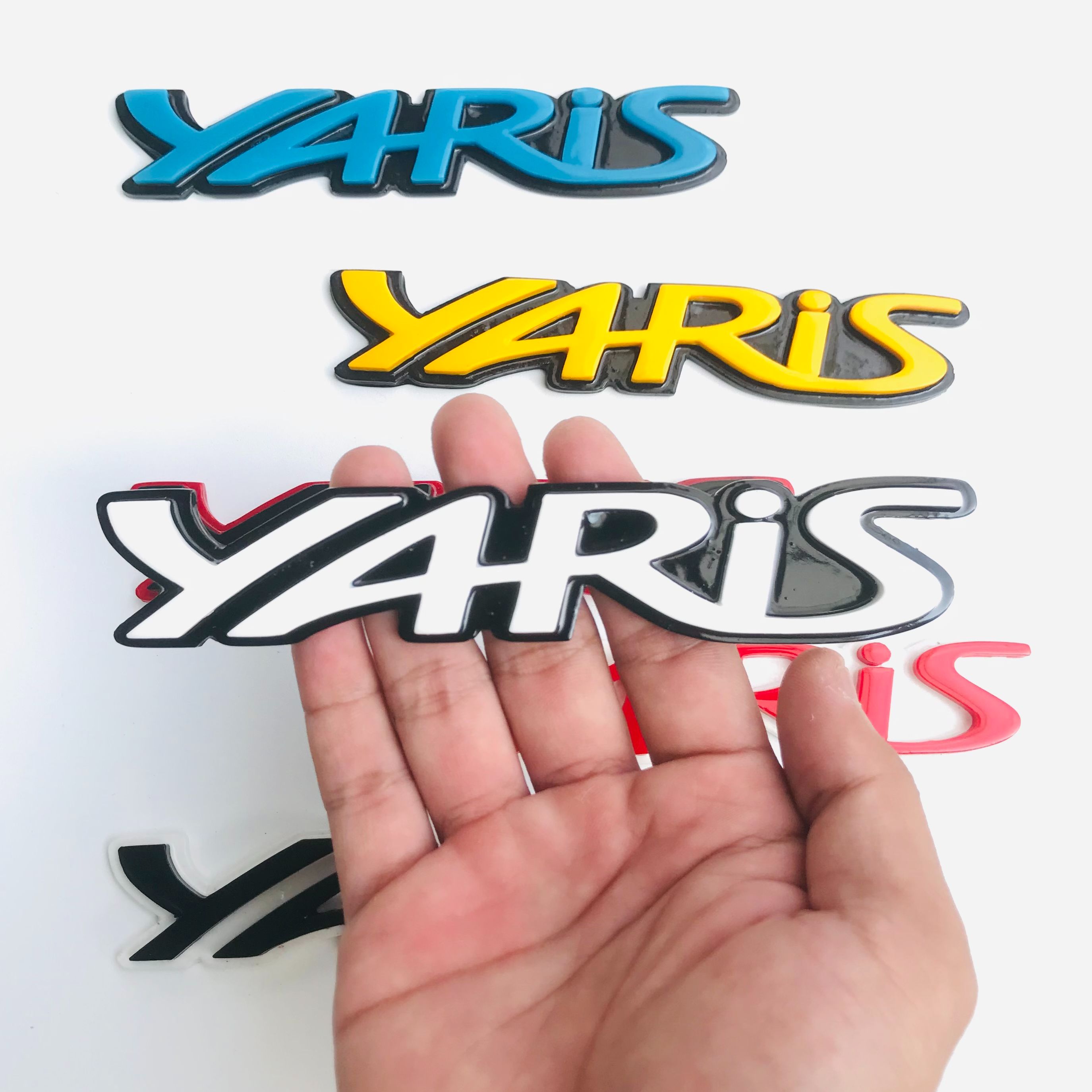EMBLEM MOBIL YARIS EKSTERIOR MOBIL TOYOTA VARIASI TIMBUL 3D BAHAN FIBERGLASS Harga 65,000 rupiah*Gratis Ongkir