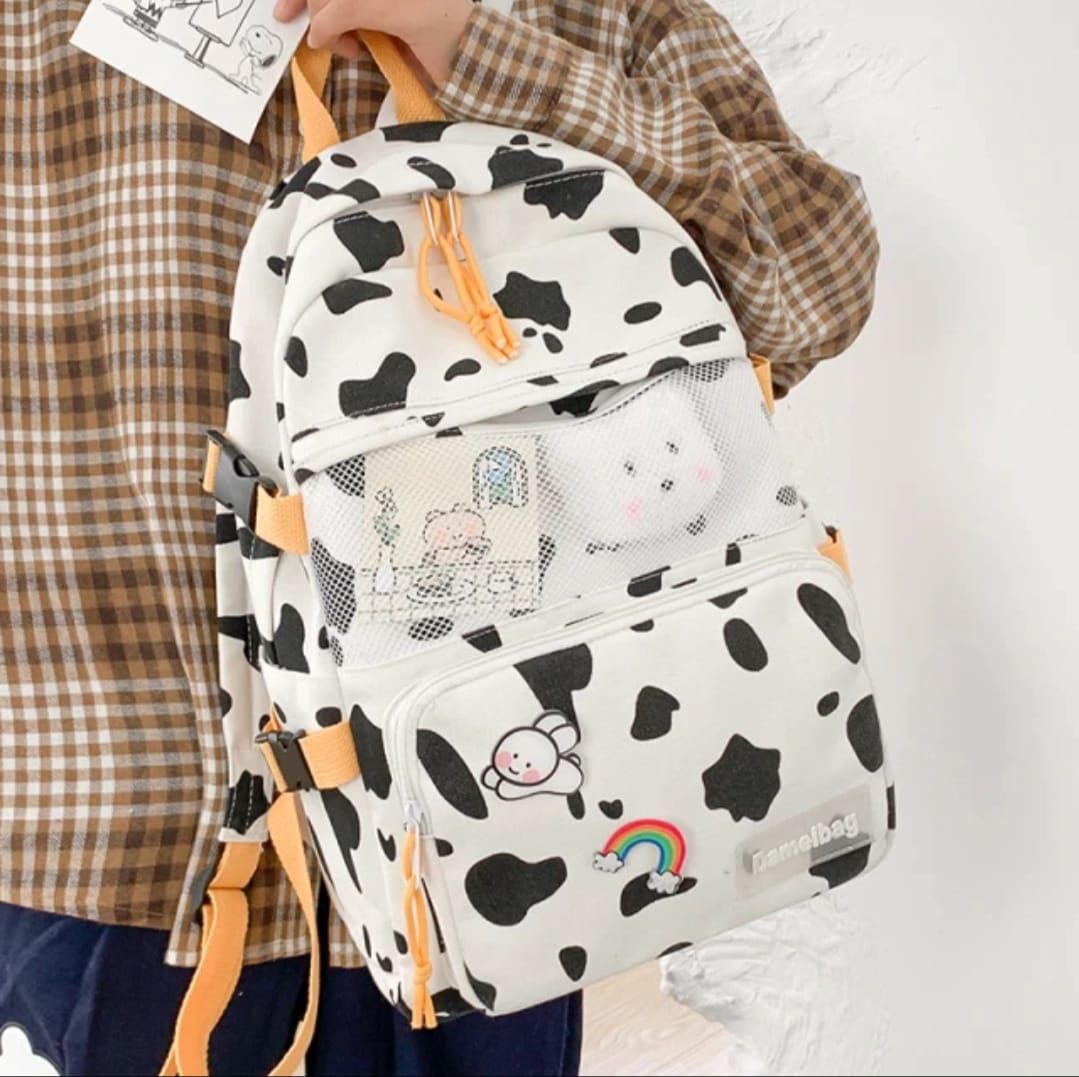 champion cow print backpack