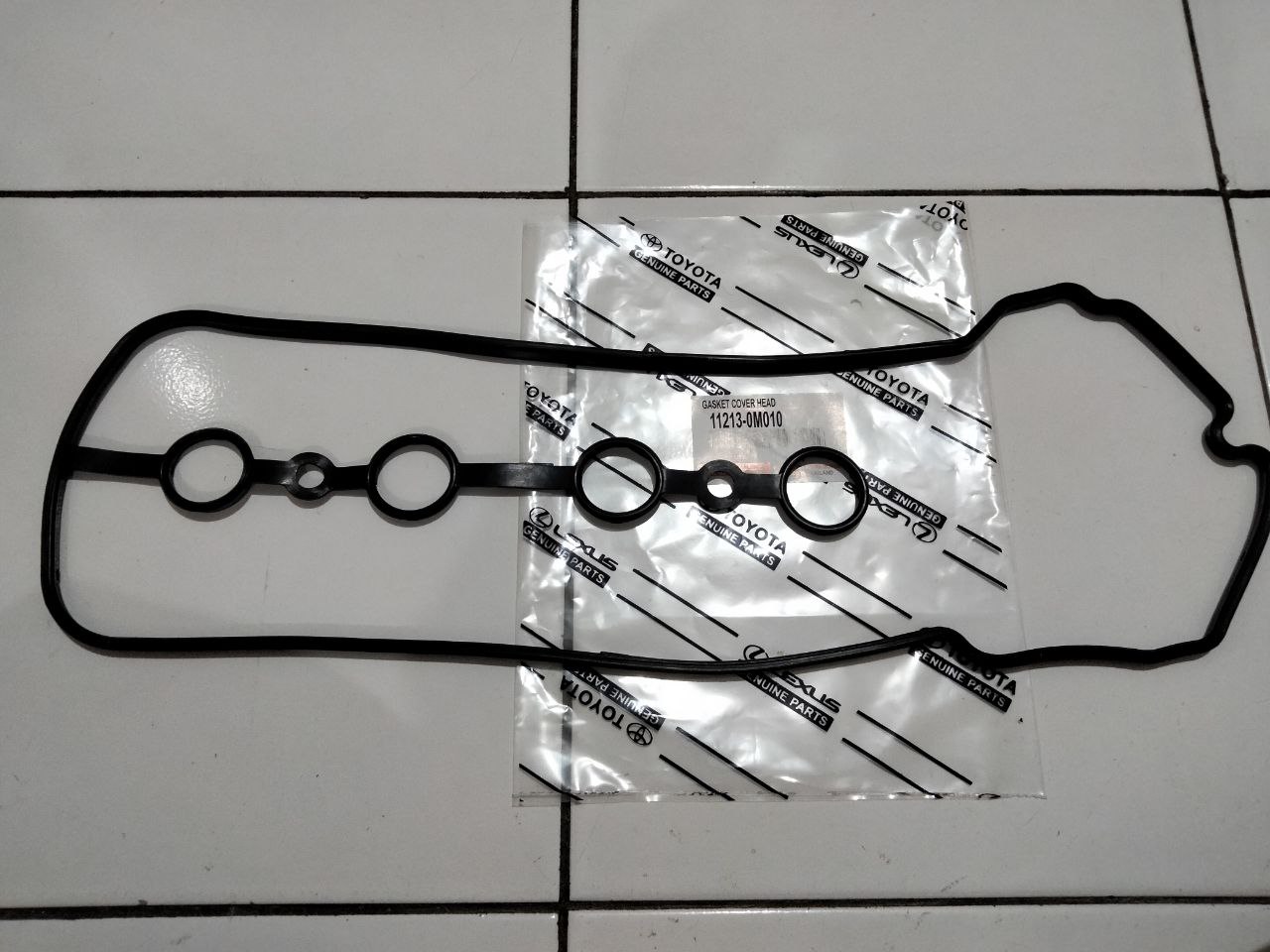 PAKING TUTUP KLEP GASKET COVER HEAD TOYOTA VIOS YARIS 11213-0M010 Harga 27,604 rupiah*Gratis Ongkir